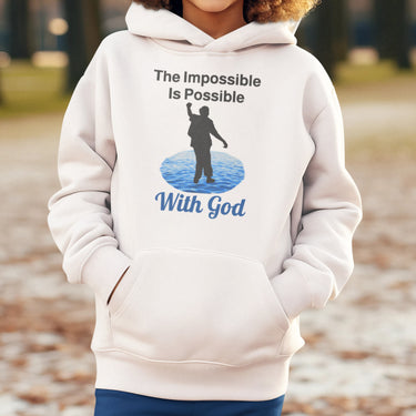 Gildan youth unisex hoodie with “Impossible Teen” design featuring a teen walking on water and uplifting message, Christian apparel made from soft preshrunk fleece, perfect for cold weather and spiritual encouragement, boy in white hoodie